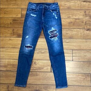 Distressed Blue Jeans